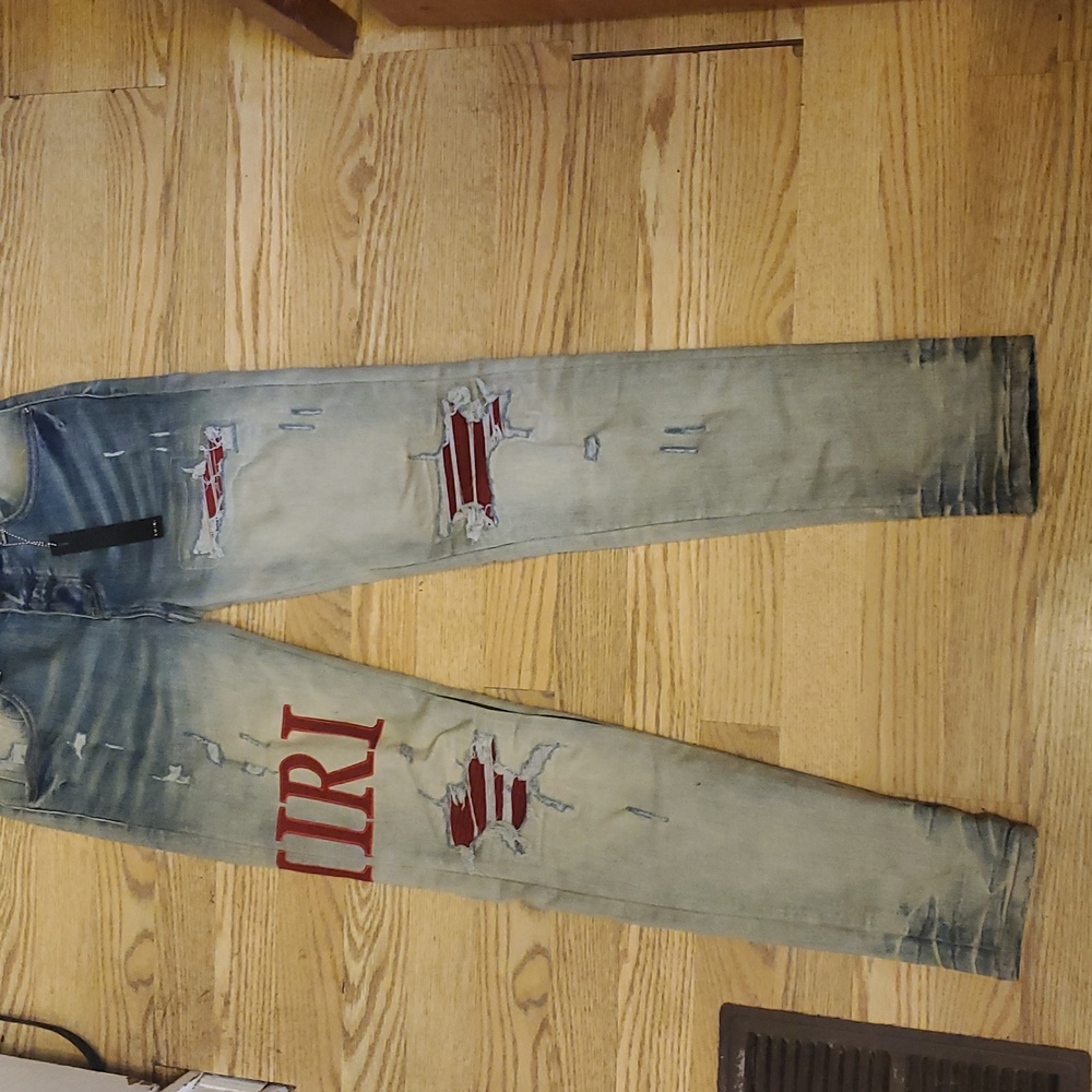 red patch amiri skinny jeans